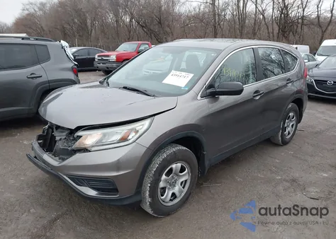 2015 Honda Cr-V Lx z USA, uszkodzony, nr VIN 5J6RM4H39FL037938